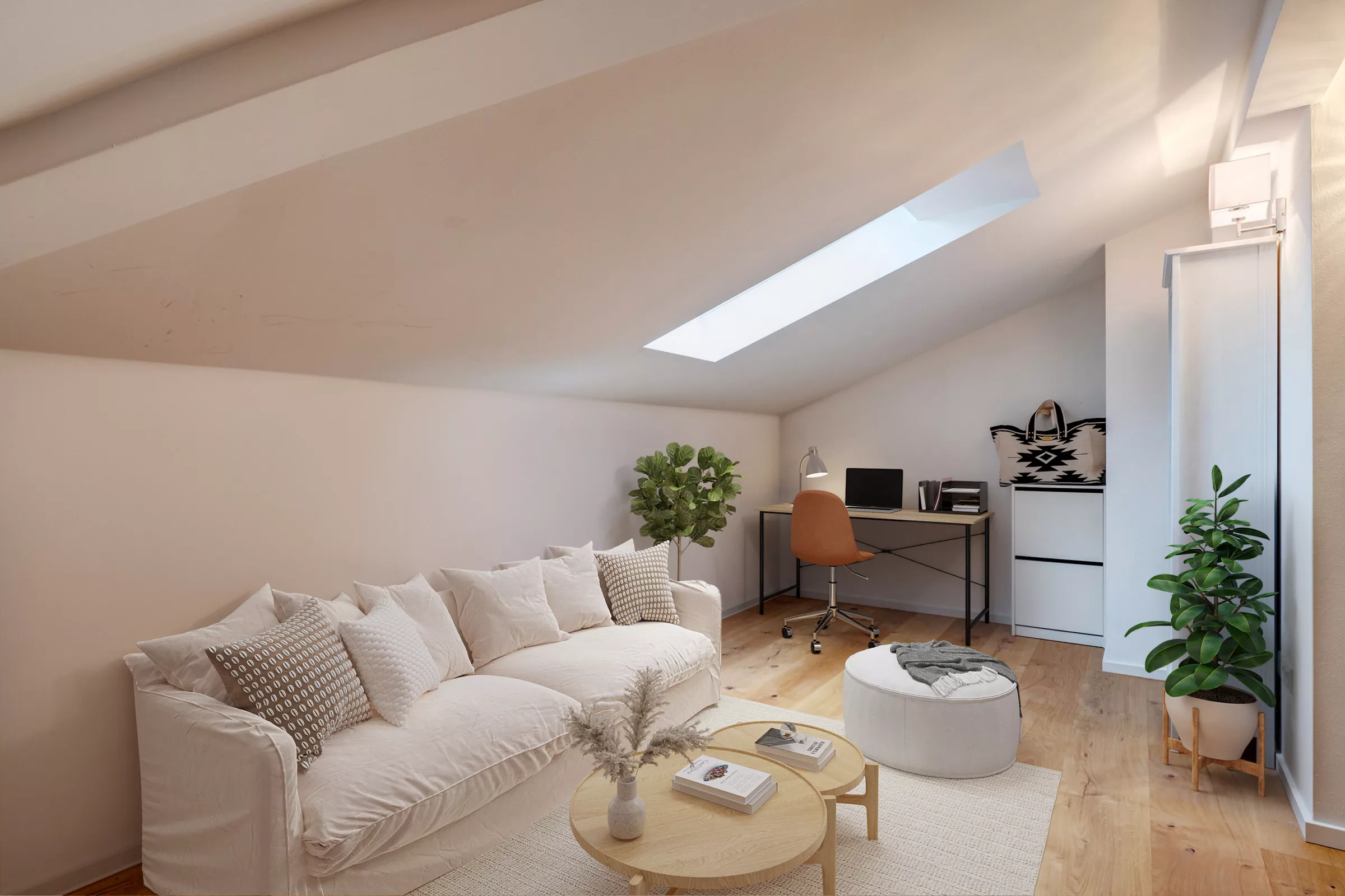 Kleine Dachgeschosswohnung mit Schreibtisch und Couch in Freising